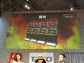 A photo from during JAEPO 2015, panel screen shows the game four cabinets.