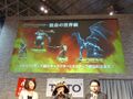 A photo from during JAEPO 2015, panel screen shows monsters miniatures.